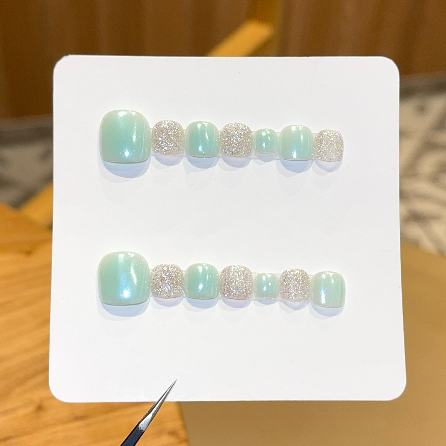 Kunstnagelset mit Glitzer- und Pastellakzent Brehn