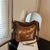 Schultertasche mit Charmanten Applikationen Brehn