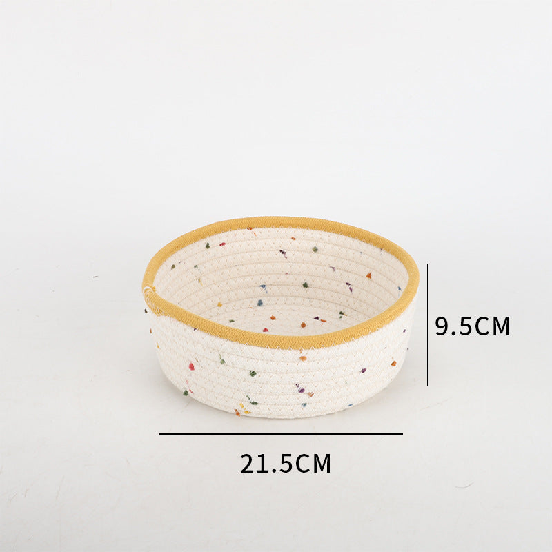 Aufbewahrungskorb aus natürlichem Baumwollstoff mit bunten Punkten