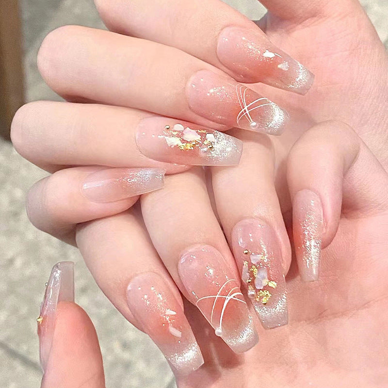 Kunstnagelset mit eleganten Glitzer- und Blumendekoren Brehn