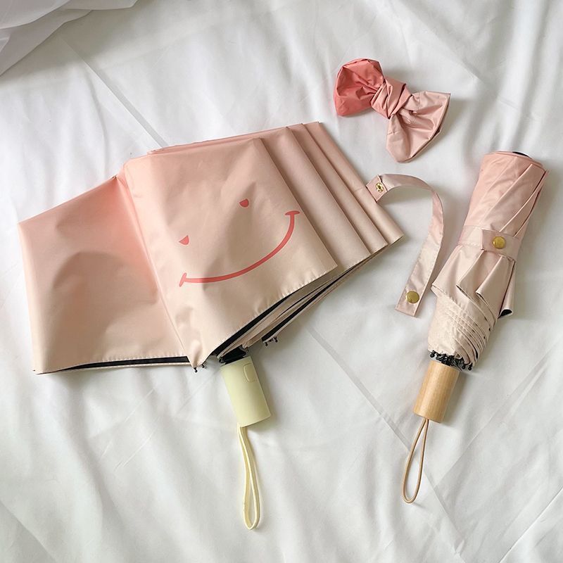 Damen Faltregenschirm mit verspieltem Design und handlichem Holzgriff Brehn