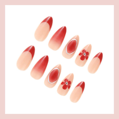 Kunstnagelset mit eleganten Blüten- und Ombre-Akzenten Brehn