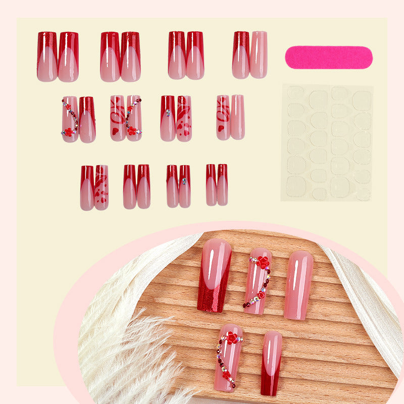 Elegantes Press-On Nagelkunstset mit floralen und Glitzerakzenten Brehn