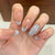Elegantes französisches Tipps Press-On Nagelset Brehn