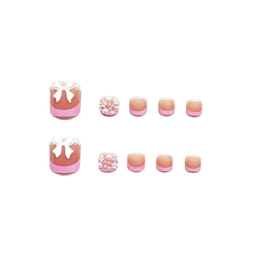 Dekorativer Press-On Nagelkunst Set mit floralen und Schleifenakzenten Brehn
