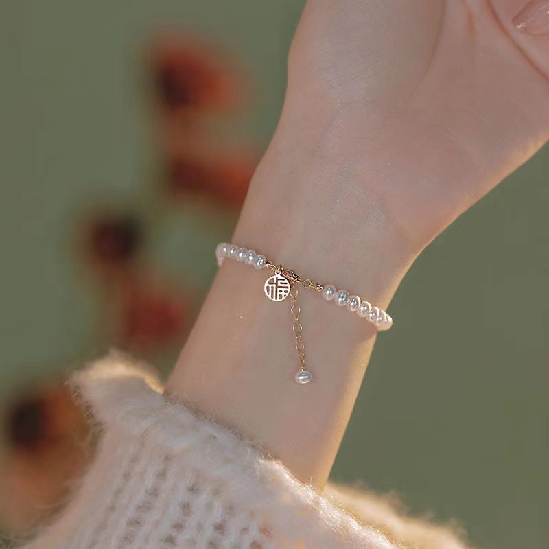 Elegante Perlen Charm Armband Brehn