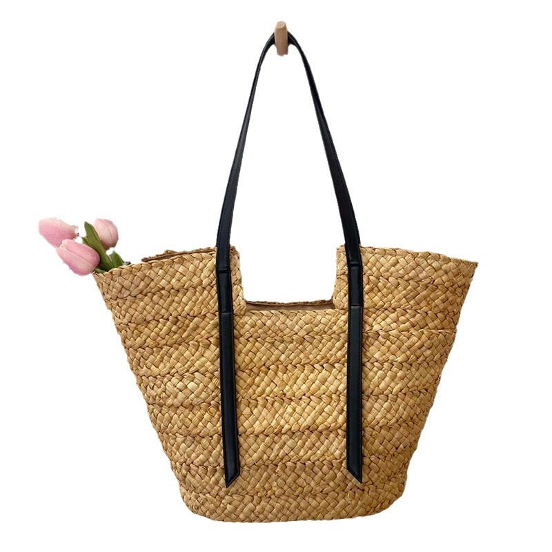 Damen Handtasche aus geflochtenem Naturmaterial mit eleganten Ledergriffen Brehn