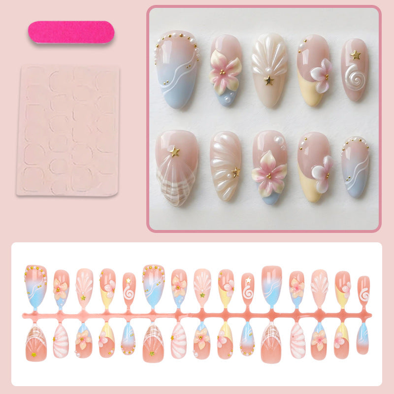 Kunstnagelset mit elegantem Blüten- und Muscheldesign Brehn