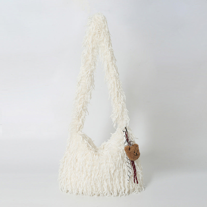 Fluffige Fransenschultertasche