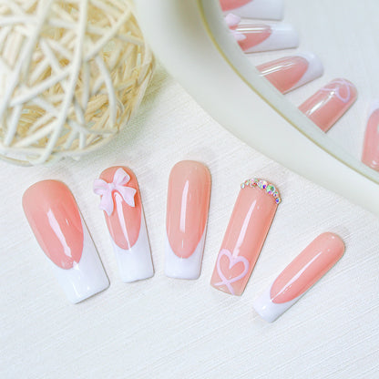 Kunstnagelset mit verspielten Schleifen- und Herzdesigns Brehn