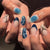 Kunstvolle Nagelkunst im modernen Wasserfarben-Design Brehn