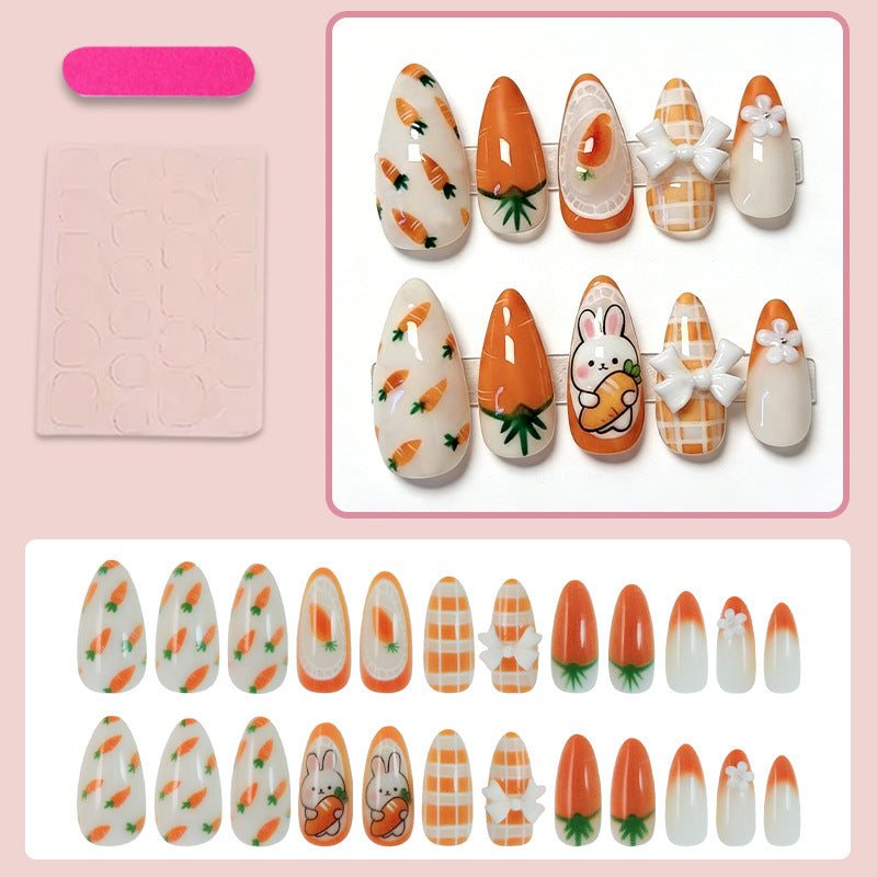 Kunstnagelset mit frühlingshaften Karotten- und Hasenmuster Brehn