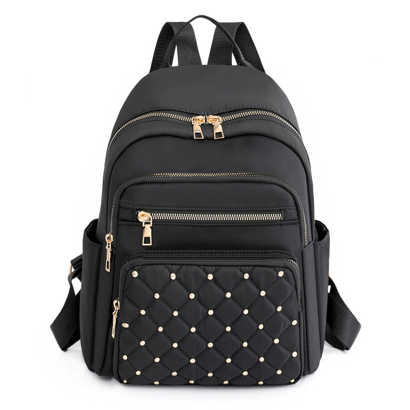 Quilted Rucksack mit dekorativen Nieten Brehn