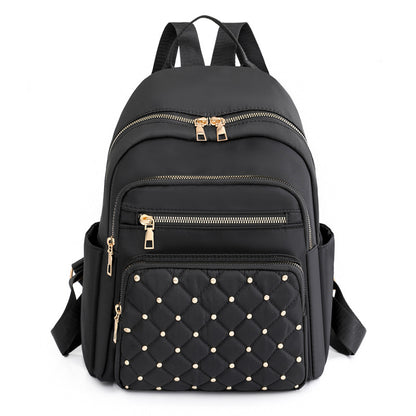 Quilted Rucksack mit dekorativen Nieten Brehn
