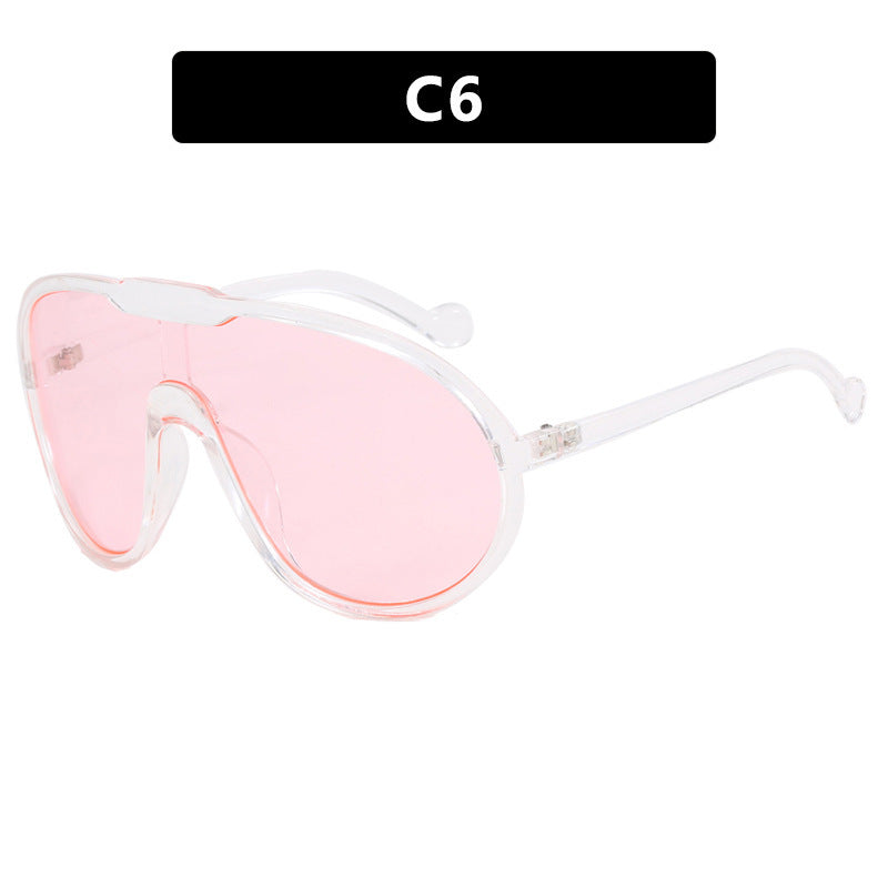 Damen Sportliche Sonnenbrille mit breitem Rahmen und gelben Gläsern Brehn
