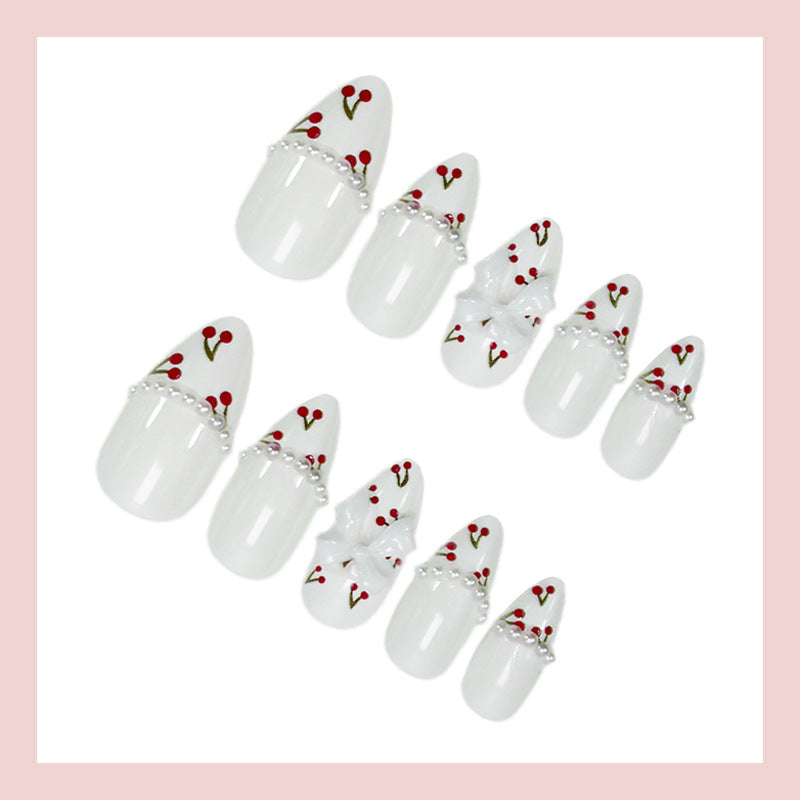 Kunstnagelset mit floralen Cherrymotiven und eleganten Schleifen Brehn