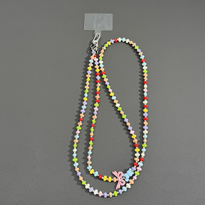 Perlenbrille Kette mit Schmetterlingsakzenten Brehn