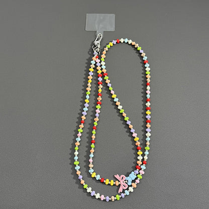 Perlenbrille Kette mit Schmetterlingsakzenten Brehn