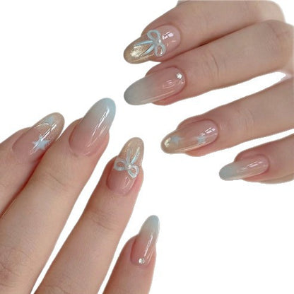 Dekoratives Press-On Nagelkunst-Set mit Schleife und Farbverlaufdetails Brehn