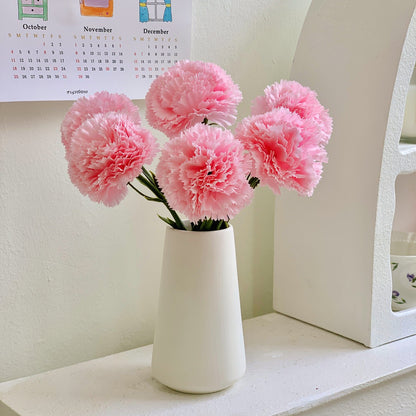 Dekoratives Blumenmittelstück für Tischdekoration