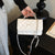 Gepolsterte Tasche mit Bow-Detail Brehn