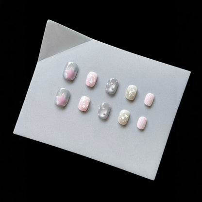 Dekoratives Press-On Nagelkunstset mit himmlischem Thema