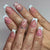 Elegantes Nagelkunst-Set mit Herzmotiven und Strassdetails Brehn