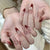 Elegantes Stiletto-Nagelset mit aufwendigen Designs Brehn