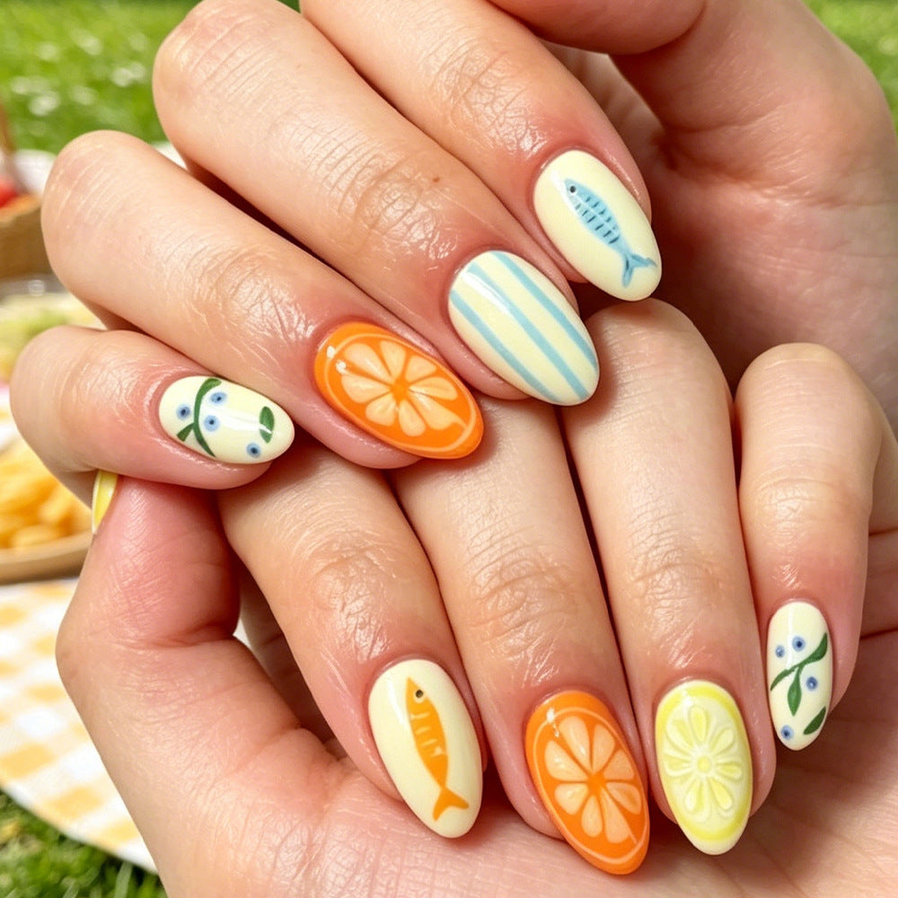 Verspieltes Nagelkunstset mit Obst- und Fischmotiv Brehn