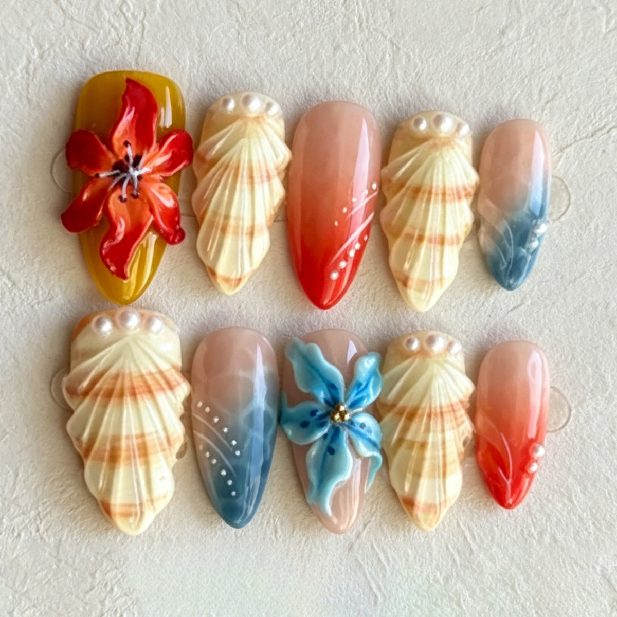 Künstlerisches von Muscheln inspiriertes Press-On Nagelkunst Set Brehn