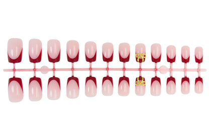 Kunstnagelset mit eleganten roten Spitzen und raffinierten Schleifenverzierungen Brehn
