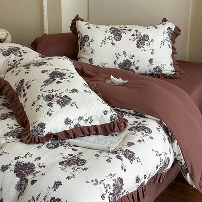 Bettwäsche-Set aus Baumwoll-Gauze mit romantischem Blumenprint und voluminösem Volant