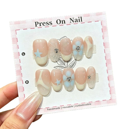 Künstlerisches Press-On-Nagel-Set mit Blumen- und Stern-Designs