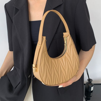 Gepolsterte Mini-Handtasche
