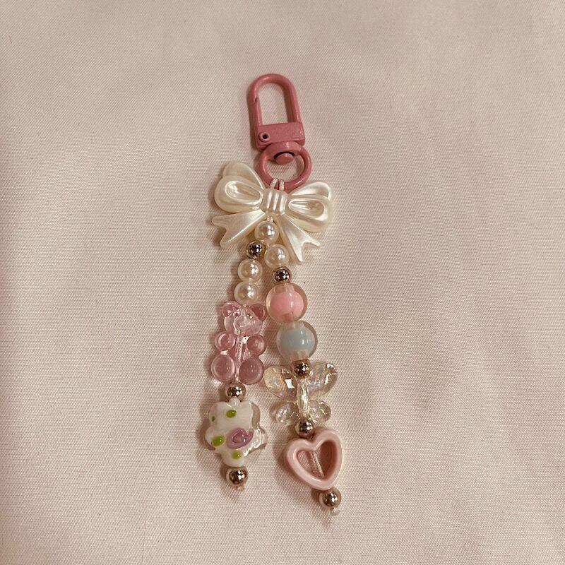 Dekorativer Charm-Handyband Brehn