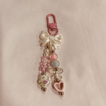 Dekorativer Charm-Handyband Brehn