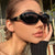 Damen modische Sonnenbrille im geschwungenen Design mit luxuriösen Details Brehn