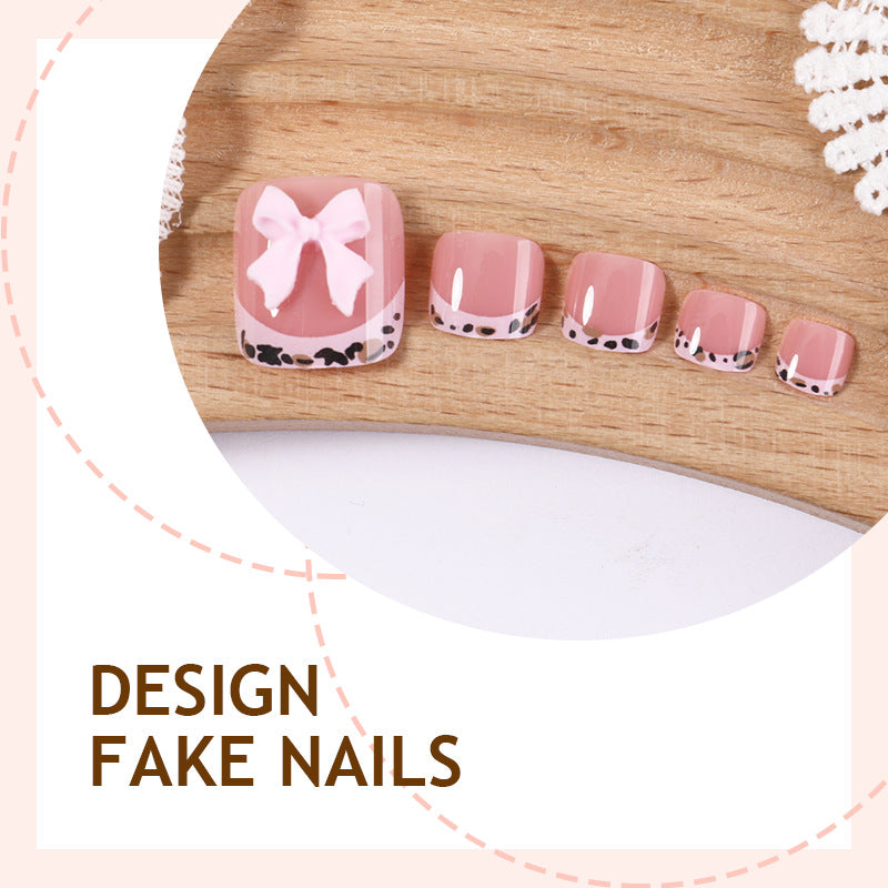 Kunstnagelset mit eleganten Schleifen und luxuriösen Designs Brehn