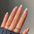 Kunstnagelset mit eleganten Schleifen- und Glitzerverzierungen Brehn