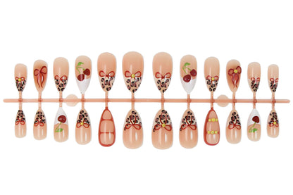 Kunstnagelset mit kreativen Schleifen- und Fruchtdesigns Brehn