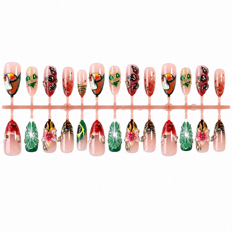 Kunstnagelset mit tropischen Motiven und eleganten Details Brehn