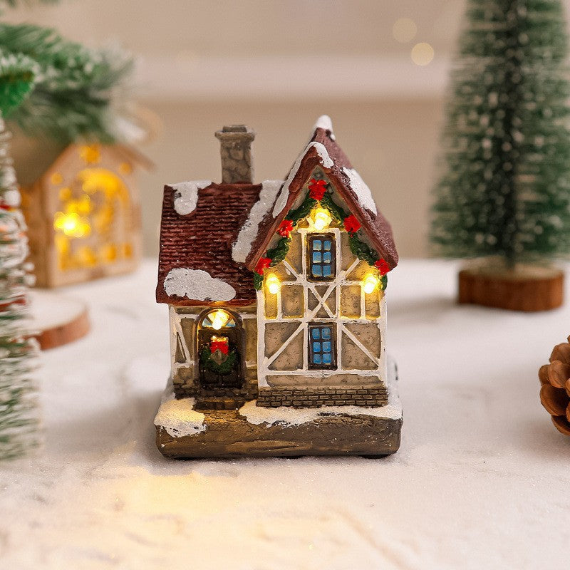 Dekoratives Weihnachtsdorf mit Lichtern Brehn