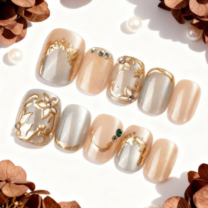 Dekoratives Press-On-Nagelkunst-Set mit eleganten floralen Verzierungen Brehn