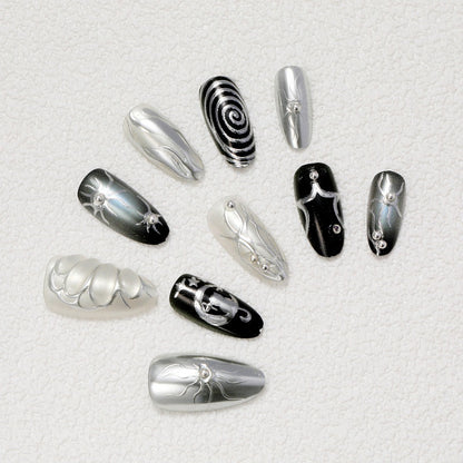Kunstnägel mit Metallic-Effekten und komplexen Designs Brehn