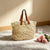 Geflochtene Strandtasche mit Ledergriffen Brehn