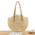 Runde Strohtasche mit Ledergriffen Brehn