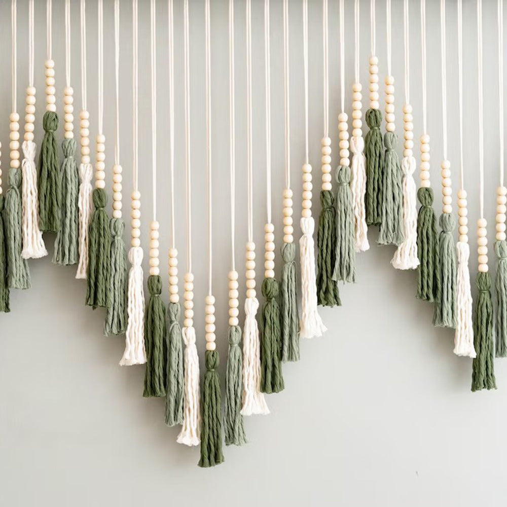 Künstlerisches Makramee-Wandbehang mit Farbverlaufs und eleganten Quasten