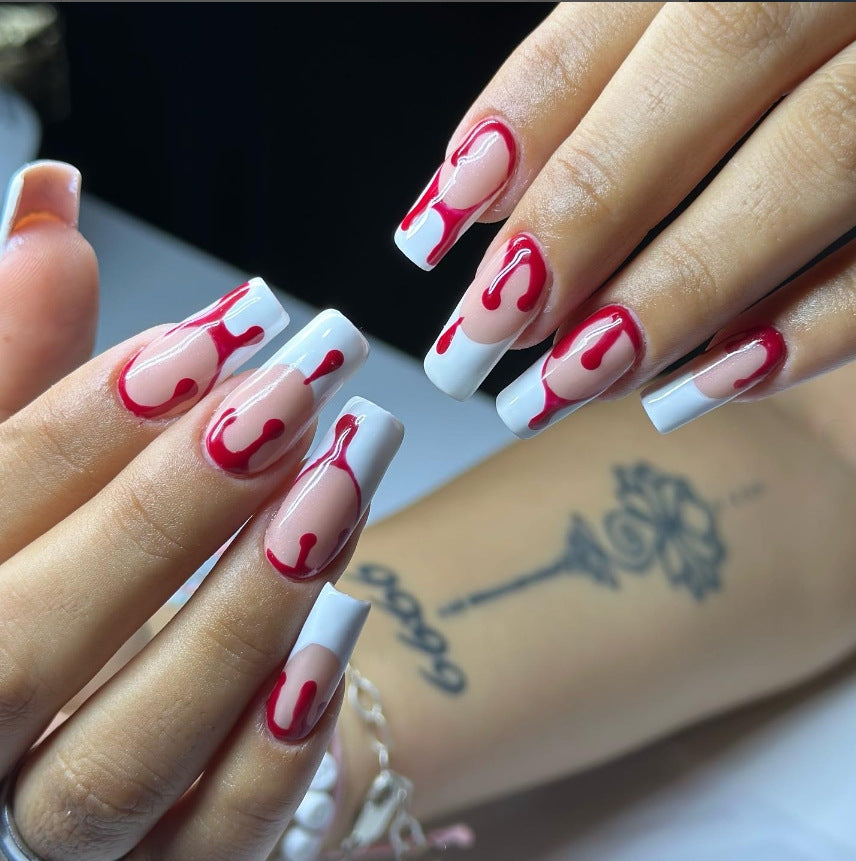 Künstlerisches Press-On Nageldesign mit Tropfeneffekt Brehn