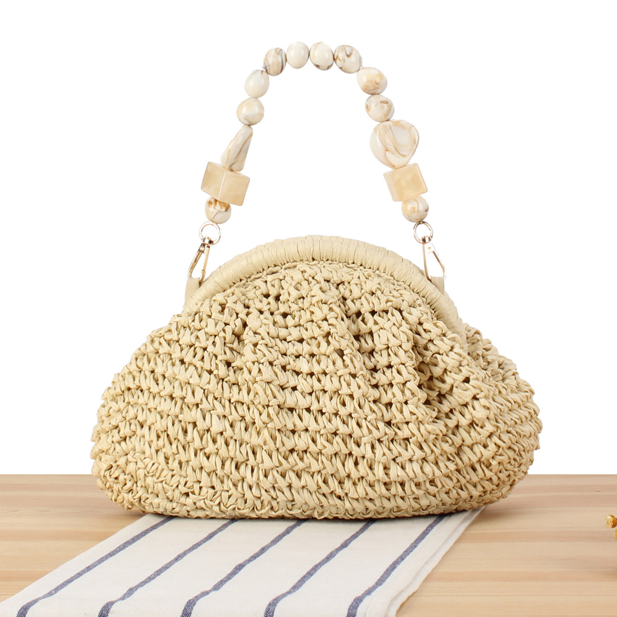 Stilsichere Handtasche mit Buntem Perlenhenkel Brehn