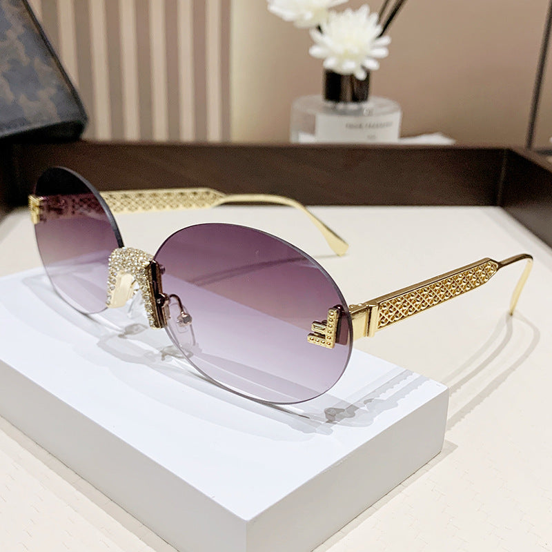 Damen Sonnenbrille mit glitzerndem Rahmen und ovalen Gläsern Brehn